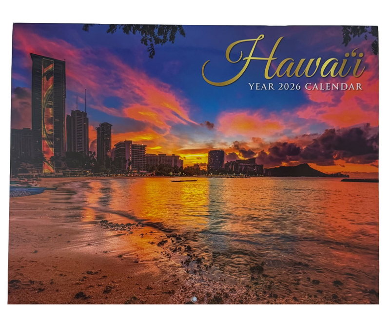 2026 Hawaii wall calendar front cover featuring a vibrant sunset over Waikīkī Beach, with silhouetted city buildings and Diamond Head in the background.