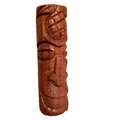 Wooden tiki idol with carvings on a white background