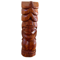 Wooden totem pole sculpture on a white background