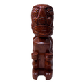 Wooden tiki with tribal design on a white background