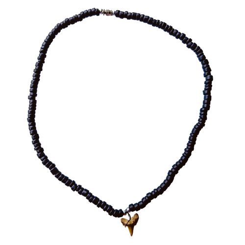 Black beaded necklace with a gold fish charm on a white background