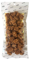 Bag of Enjoy Shoyu Age Arare fried rice crackers with yellow label showing ingredients and nutrition facts

