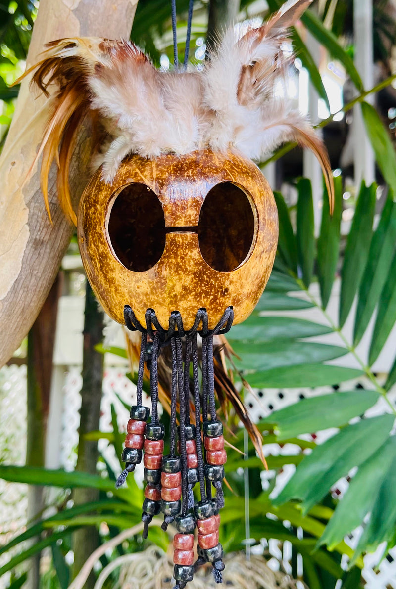 Handmade Ikaika Makakiʻi Hawaiian warrior helmet mask with brown feathers and beads, made from real coconut